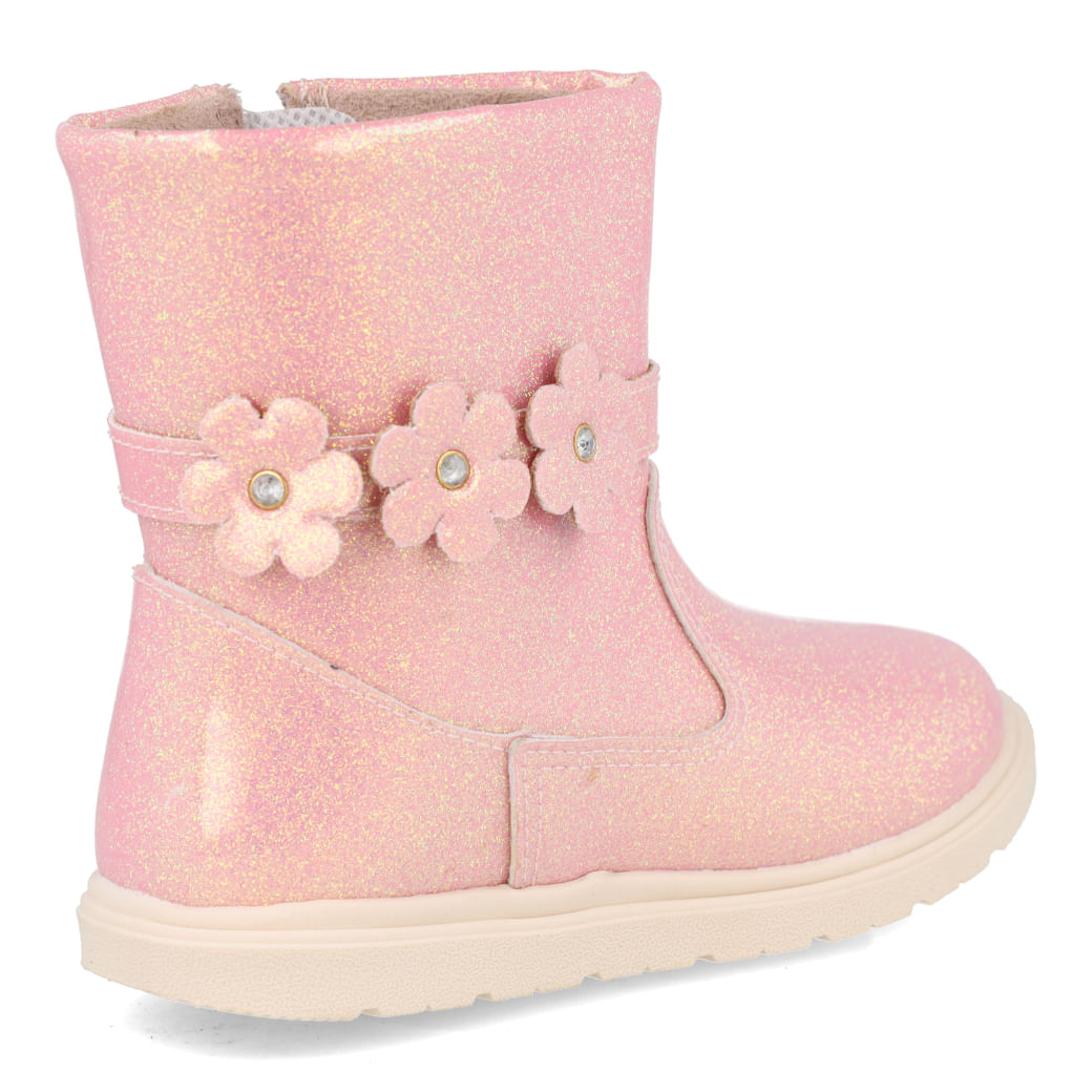 Detalhes do design e solado antiderrapante da bota infantil rosa
